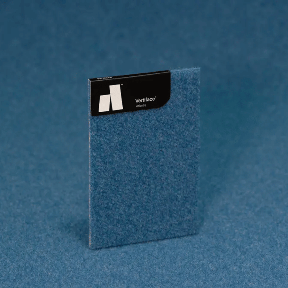 Autex Vertiface® Akira sample showing soft acoustic texture on a blue background.