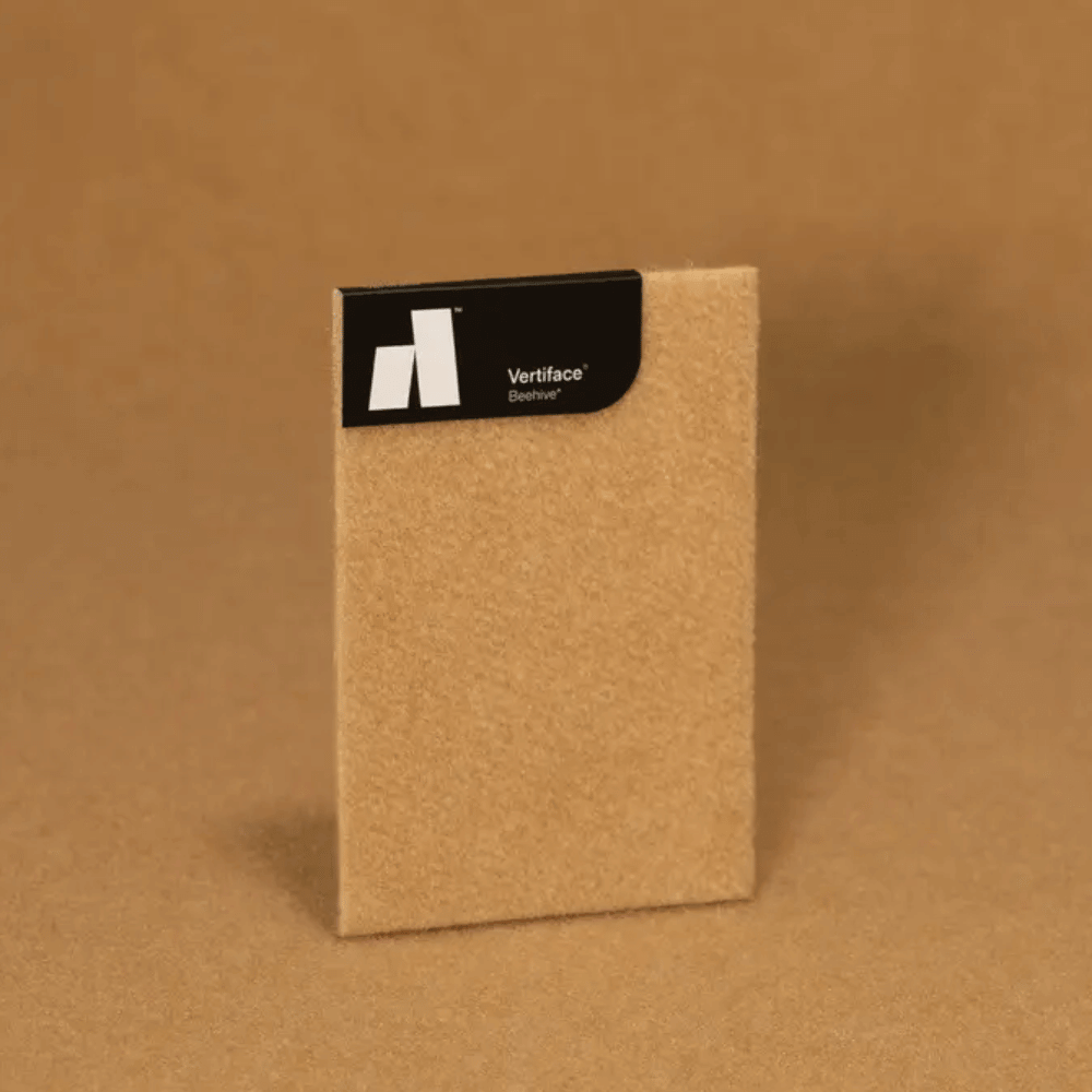 Vertiface® panel with label on a brown background showcasing textured acoustic material.