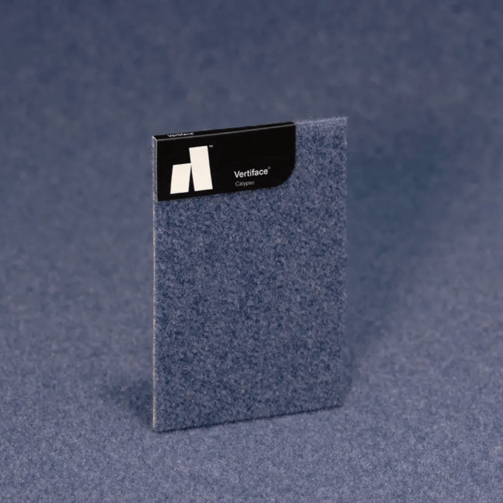 Autex Vertiface® sample in blue, showcasing soft texture and sound-absorbing properties for acoustic design.