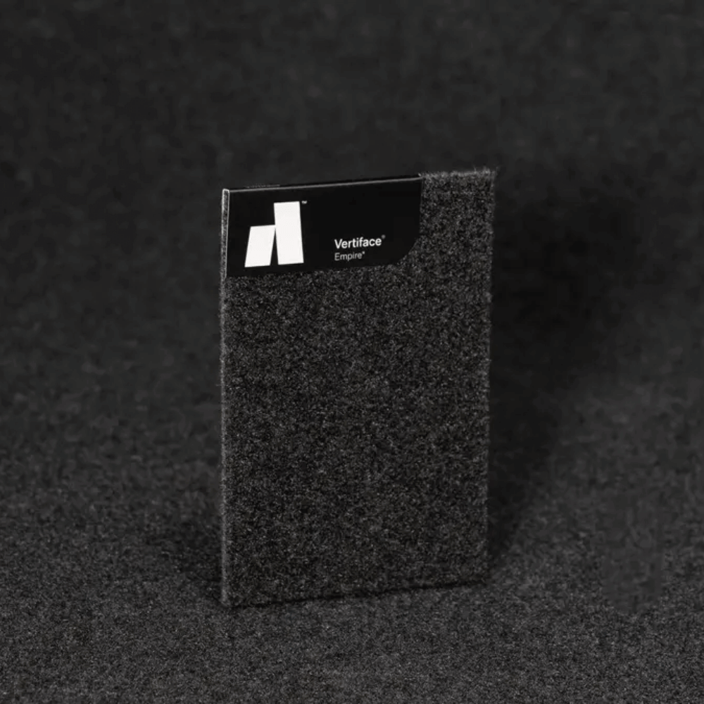 Vertiface® Empire® acoustic panel sample in gray felt texture on a dark background.