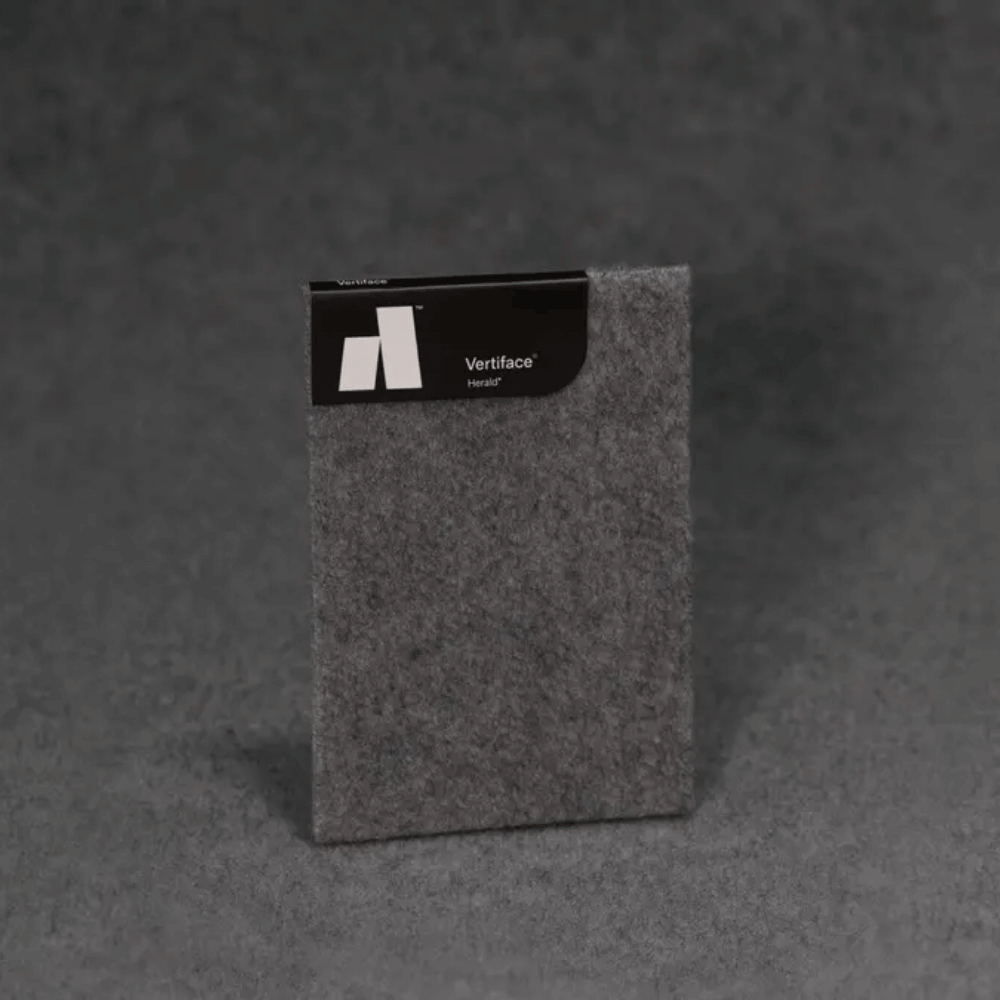 Autex Vertiface acoustic panel sample in grey color on a textured background.