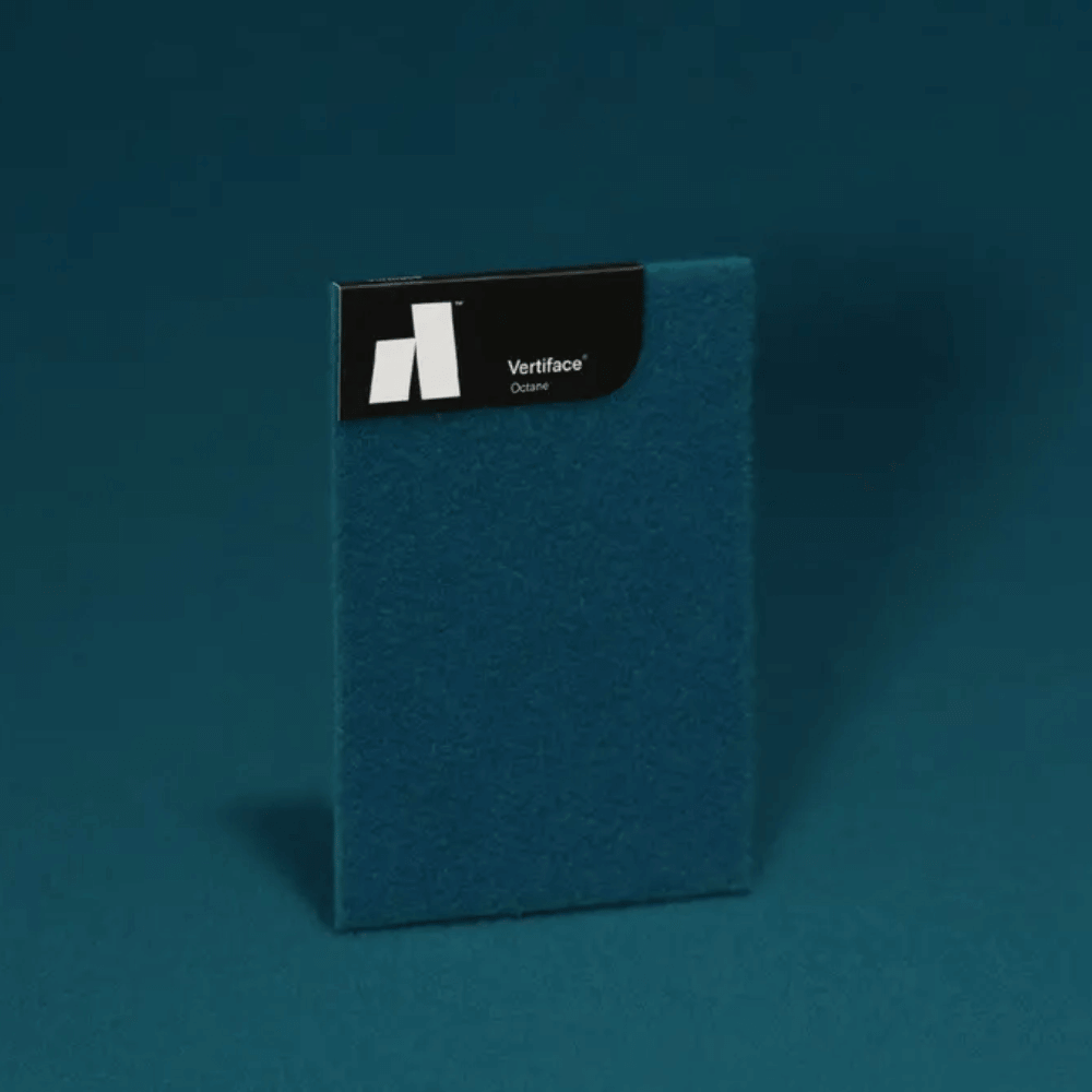 Vertiface® acoustic panel sample in deep teal, showcasing texture and sound-absorbing properties.