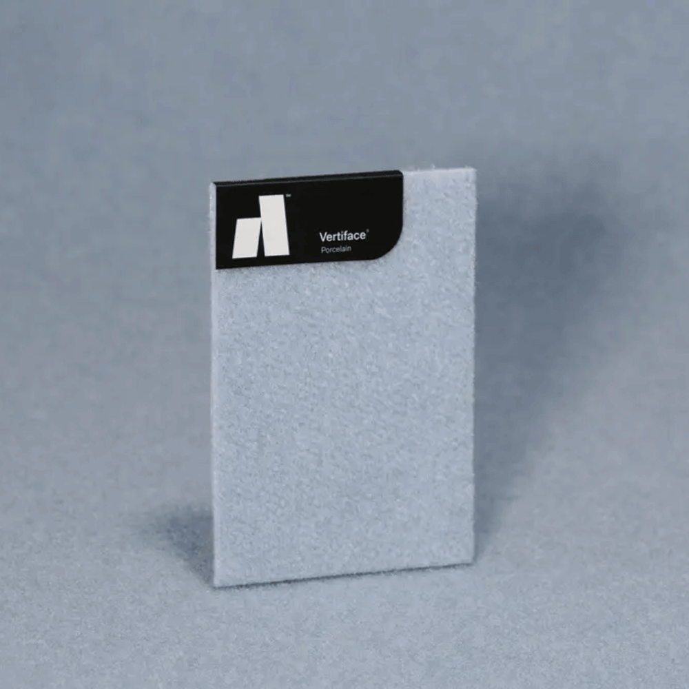 Autex Vertiface® sample in gray, showcasing its texture and branding on a soft, felt-like surface.