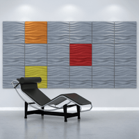Acoustek Newport Collection acoustic wall tiles in various colors complementing a modern lounge chair.
