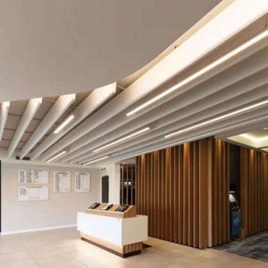 Modern interior with Autex Frontier Tundra Acoustic Fins enhancing sound absorption and style in a commercial space.