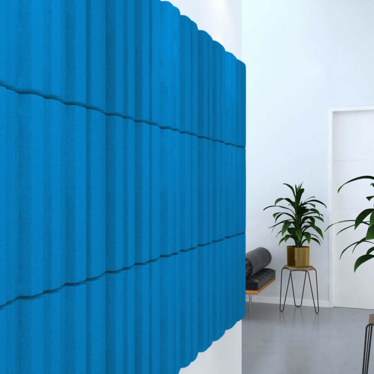 Acoustek Newport Collection blue acoustic wall tiles enhancing soundproofing in modern interior design.