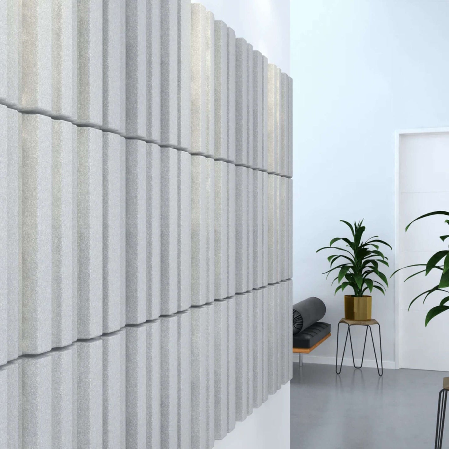 Acoustek Newport Acoustic panels in a modern interior, featuring textured gray wall tiles for noise reduction.