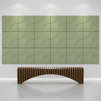 Acoustek Cavasinni acoustic tiles on a modern wall with a stylish curved bench underneath.
